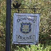 The sign for Downing House – originally 'The Downing Arms' but better known as 'The Scratching Cat' – on Lower Road, Croydon, Cambridgeshire. It closed in 1995 and is now a private residence.