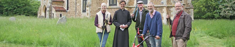 St Denis' church East Hatley, Cambridgeshire – blessing of the new mower. Under the churchyard management plan, the grass is allowed to grow very long – the Alco scythe (or scissor) mower makes cutting long grass relatively easy. Pictured left to right are Sarah Brennan, Reverend Steven Rothwell, John O'Sullivan, Peter Mann and Michael Pearson – 9-6-13. Photo: Philippa Pearson.