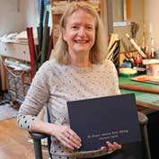 Jenny Ollerenshaw with the St Denis' church visitors' book she made – 10th September 2019. Jenny lives in East Hatley and does bookbinding as a hobby.