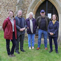 (l to r) Rachel Morley (director, FoFC), Aiden McRae Thomson (stained glass artist), Joyce Denby (East Hatley resident), Eric Barnes-Green (FoFC maintenance), Stephanie Norris (architect) outside St Denis' church, East Hatley on 30th May, 2024.  They were here to look at the new east window will go. Photo by Peter Mann. 