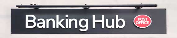 Banking Hub and Post Office logos above the Royston shop front in Kneesworth Street – photo by https://buzzassociates.co.uk, 1st January 2026.